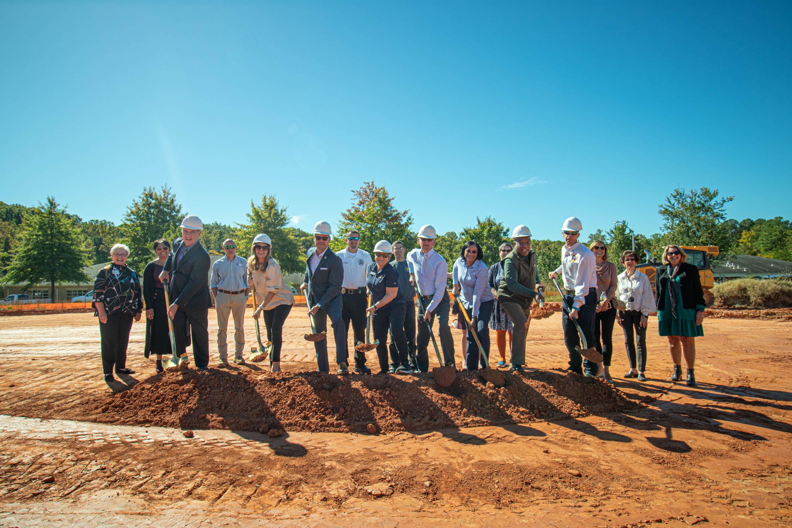 Civic leaders and representatives of The Bridges on Parkview gathered together to celebrate the community’s groundbreaking Thursday. Those turning the soil over included Development Manager Kinch Waldrep, Henderson-Vance Chamber of Commerce Board of Directors member Tanya Evans, Henderson Mayor Eddie Ellington, The Bridges on Parkview’s Director of New Development Debra Richardson, Vance County Commissioner Vance County Commissioner Tommy Hester, Vance County HR Director Argretta Johen, Vance County Sheriff Curtis Brame and Henderson Fire Chief Steve Cordell 
Photo Courtesy of The Bridges on Parkview